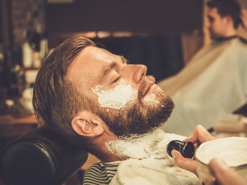 Man getting beard shave